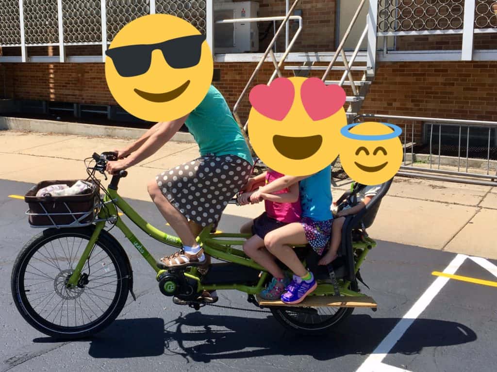 Picture of our family riding a cargo bike